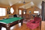 Clubhouse with game room and pool table and air hockey. 